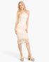 Beach Rose Co. stone ribbed halter neck midi dress with fringe hem worn by a blonde model in studio