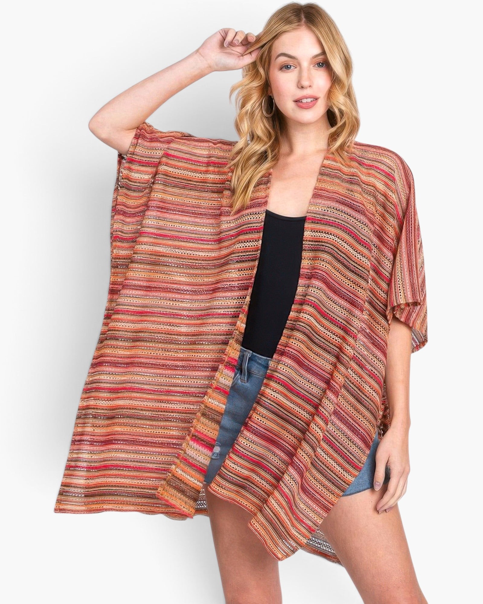 Beach Rose Co. model wearing a multi-color stripe crochet open front cover-up with a relaxed fit
