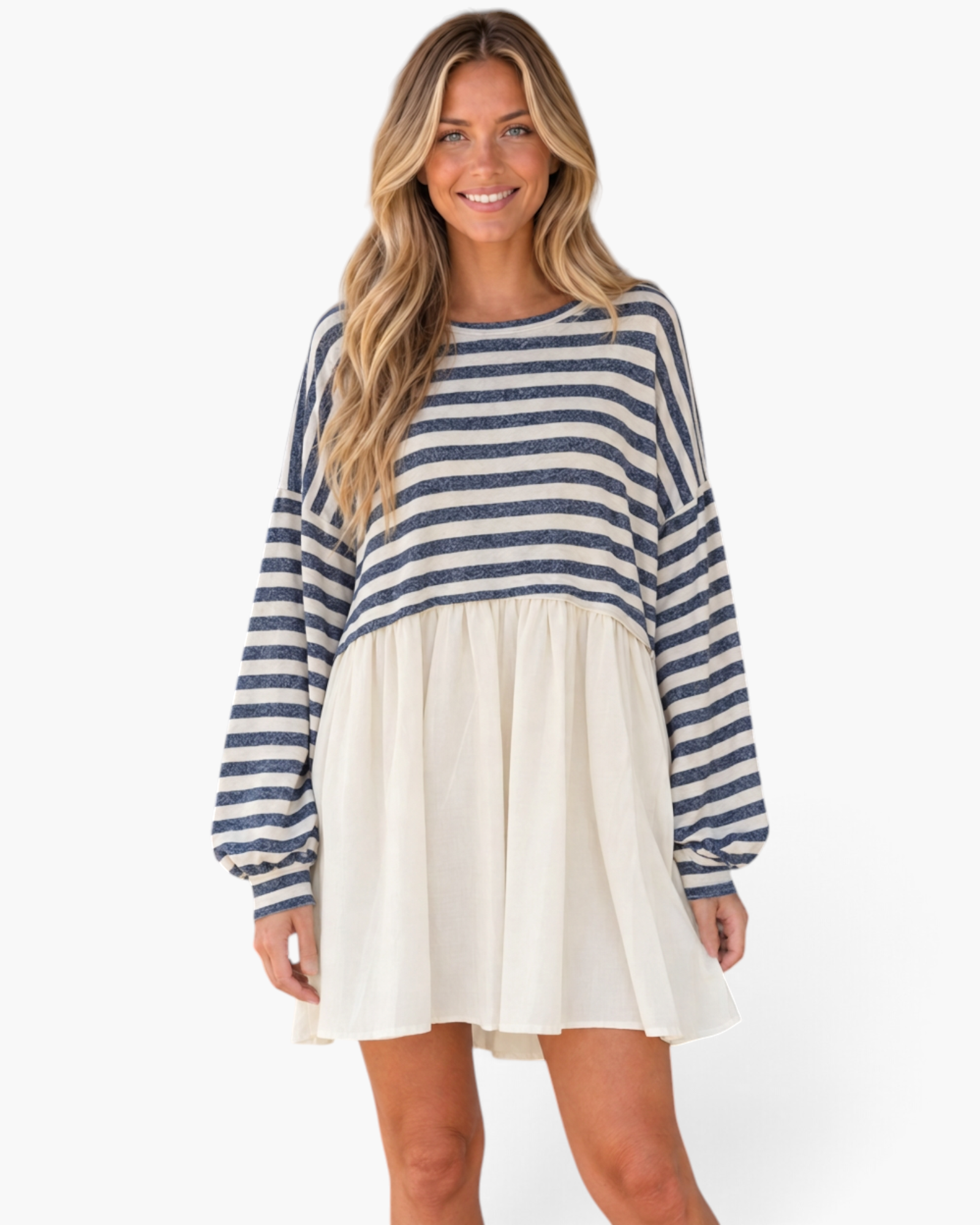 Beach Rose Co. navy and ivory striped babydoll mini dress with long billowy sleeves and a gathered skirt on a model