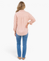 Beach Rose Co. brown and cream vertical striped button-up shirt with a relaxed fit and curved hem, worn with blue jeans