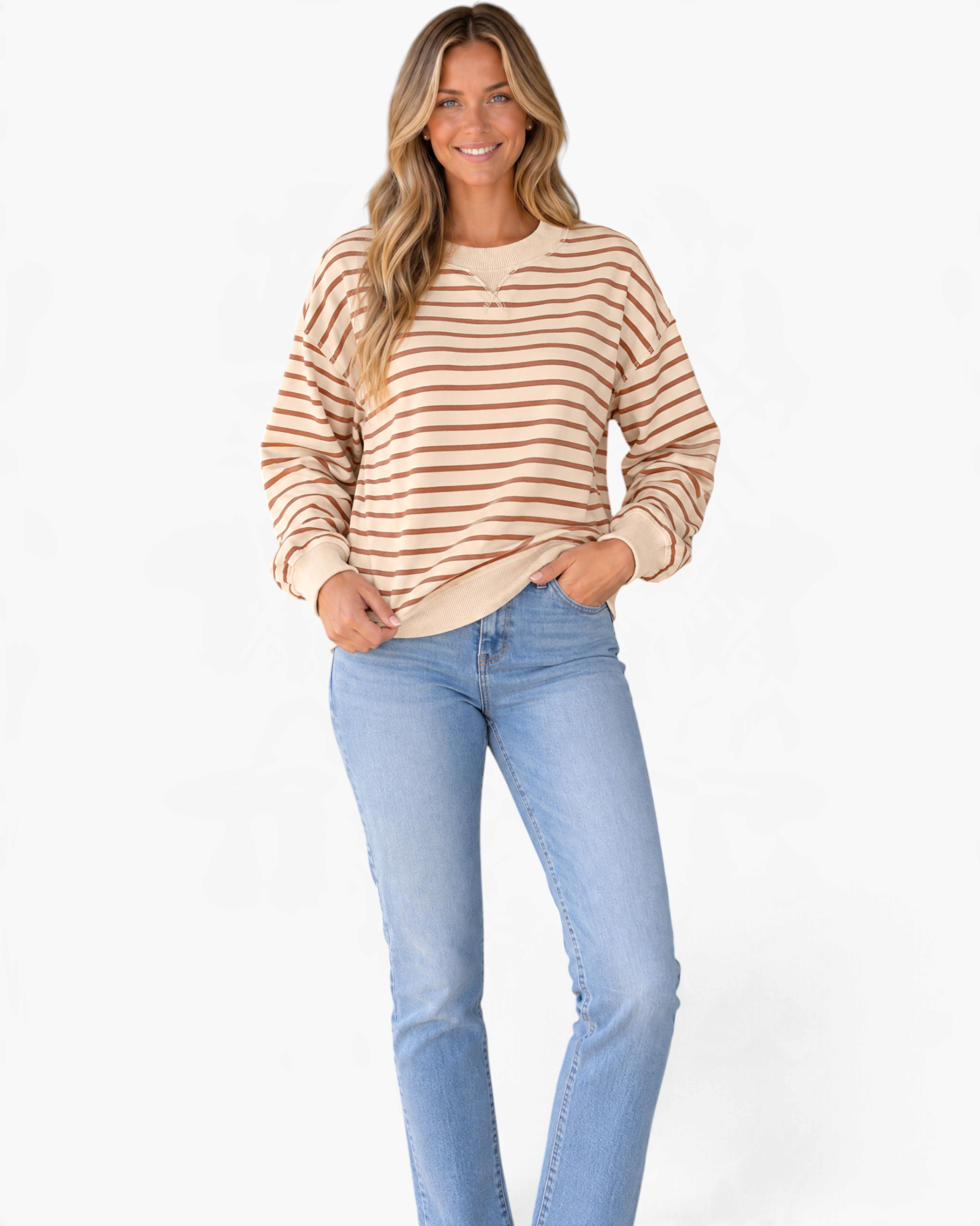 Beach Rose Co. cream and brown striped cotton crewneck sweatshirt with dropped shoulders worn by a smiling model.