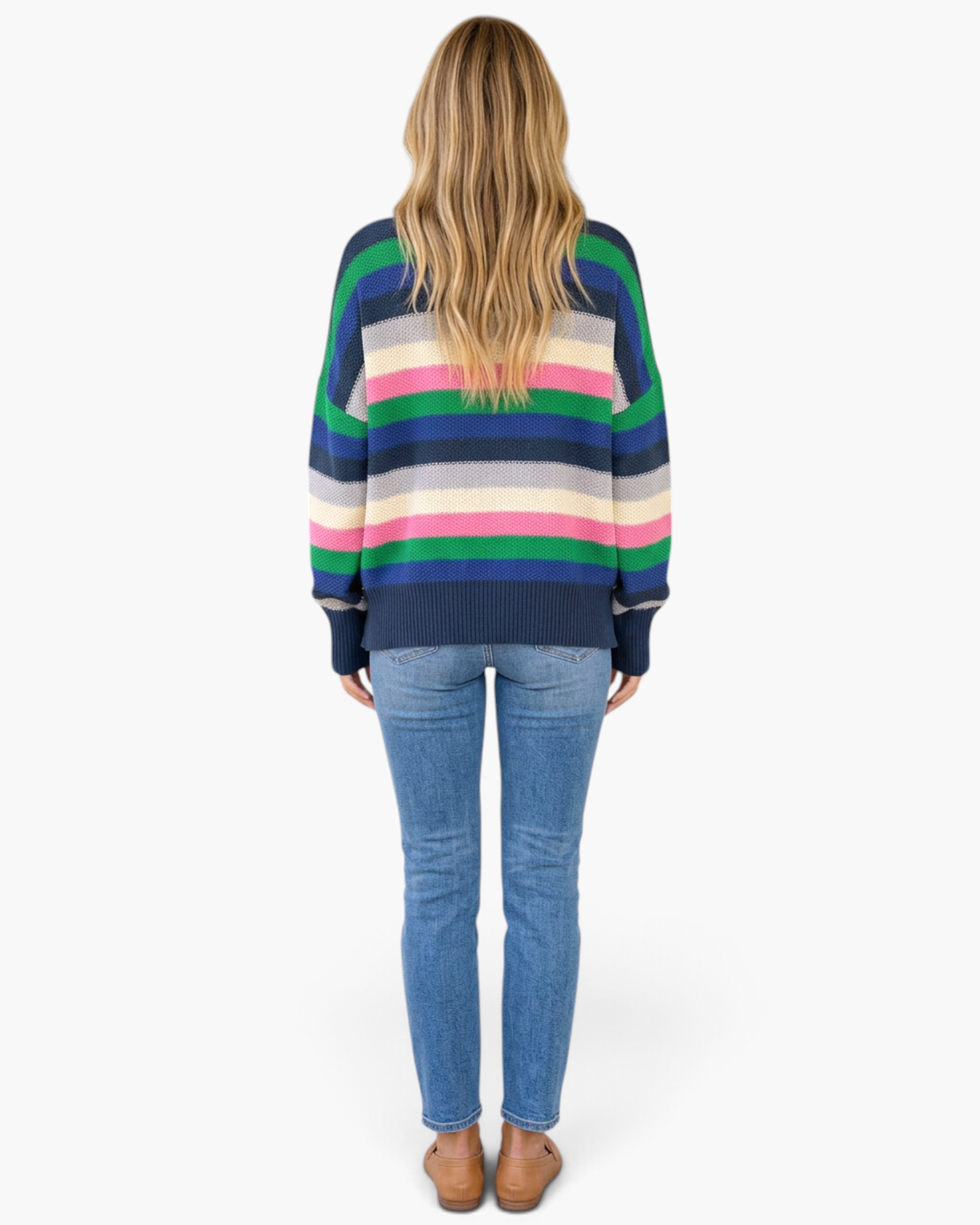 Back view of a woman wearing a Beach Rose Co. navy multicolor striped textured knit sweater with jeans
