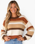 Beach Rose Co. multi-colored striped knit sweater with crew neck and long sleeves worn by a smiling blonde model