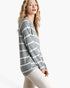 Beach Rose Co. long sleeve top with grey and white horizontal stripes and a round neck worn by a blonde model