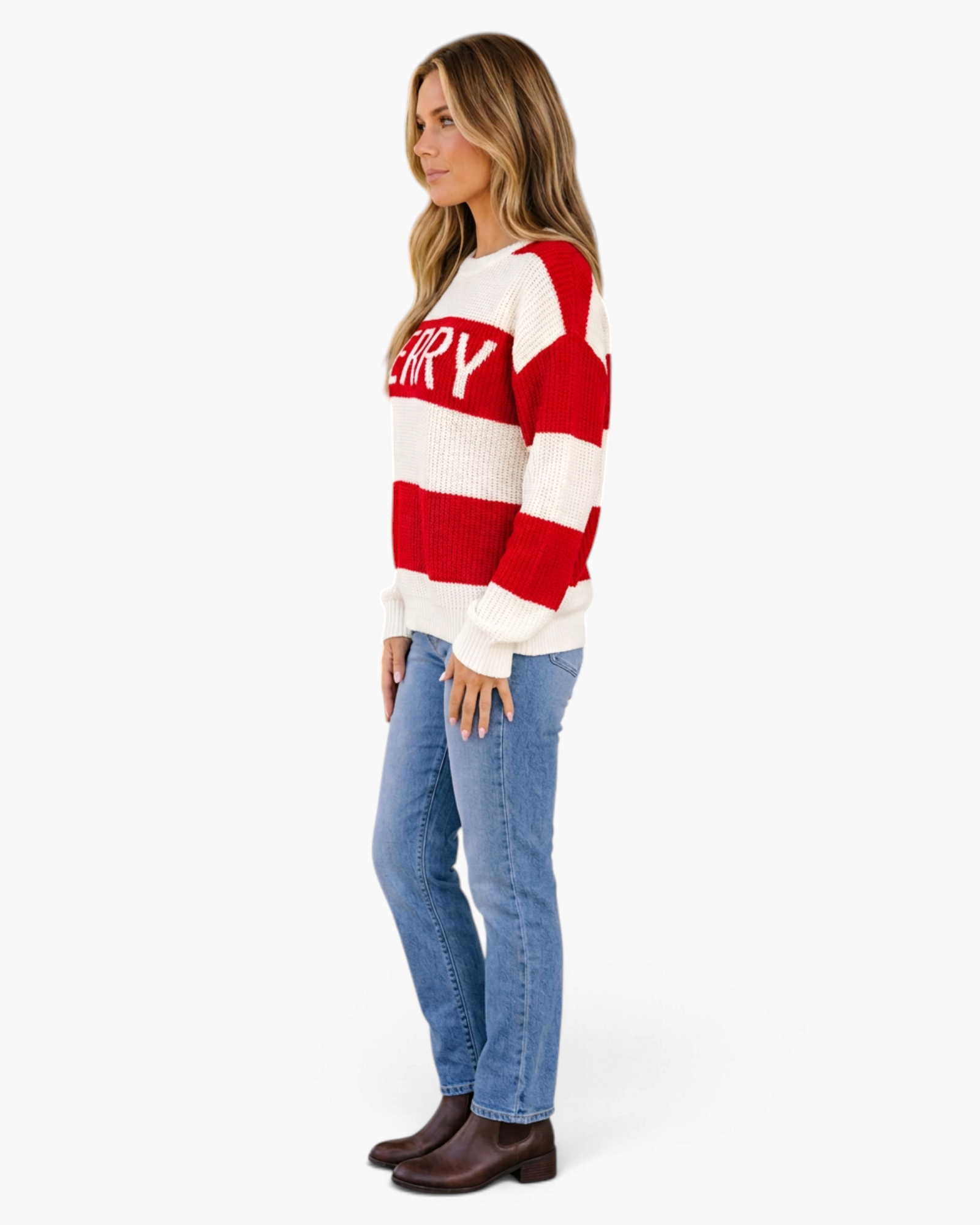 Beach Rose Co. red and cream striped crewneck sweater with MERRY lettering worn by a woman with jeans and boots