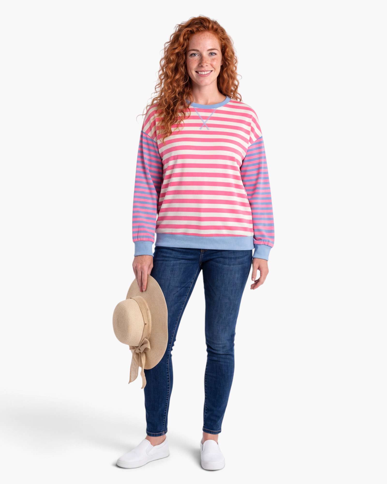 Beach Rose Co. plus size sweatshirt with pink and cream stripes, blue sleeves, and ribbed trim on a smiling model.