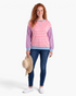 Beach Rose Co. plus size sweatshirt with pink and cream stripes, blue sleeves, and ribbed trim on a smiling model.