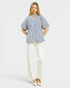 Beach Rose Co. blue and ivory striped puff sleeve babydoll top made of cotton and polyester blend.