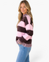 Beach Rose Co. relaxed fit pullover sweater with brown and pink stripes, high neck, and ribbed cuffs on a model.