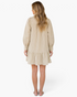 Back view of a Beach Rose Co. taupe and ivory striped mini shirt dress with long sleeves and a flounced ruffle hem.