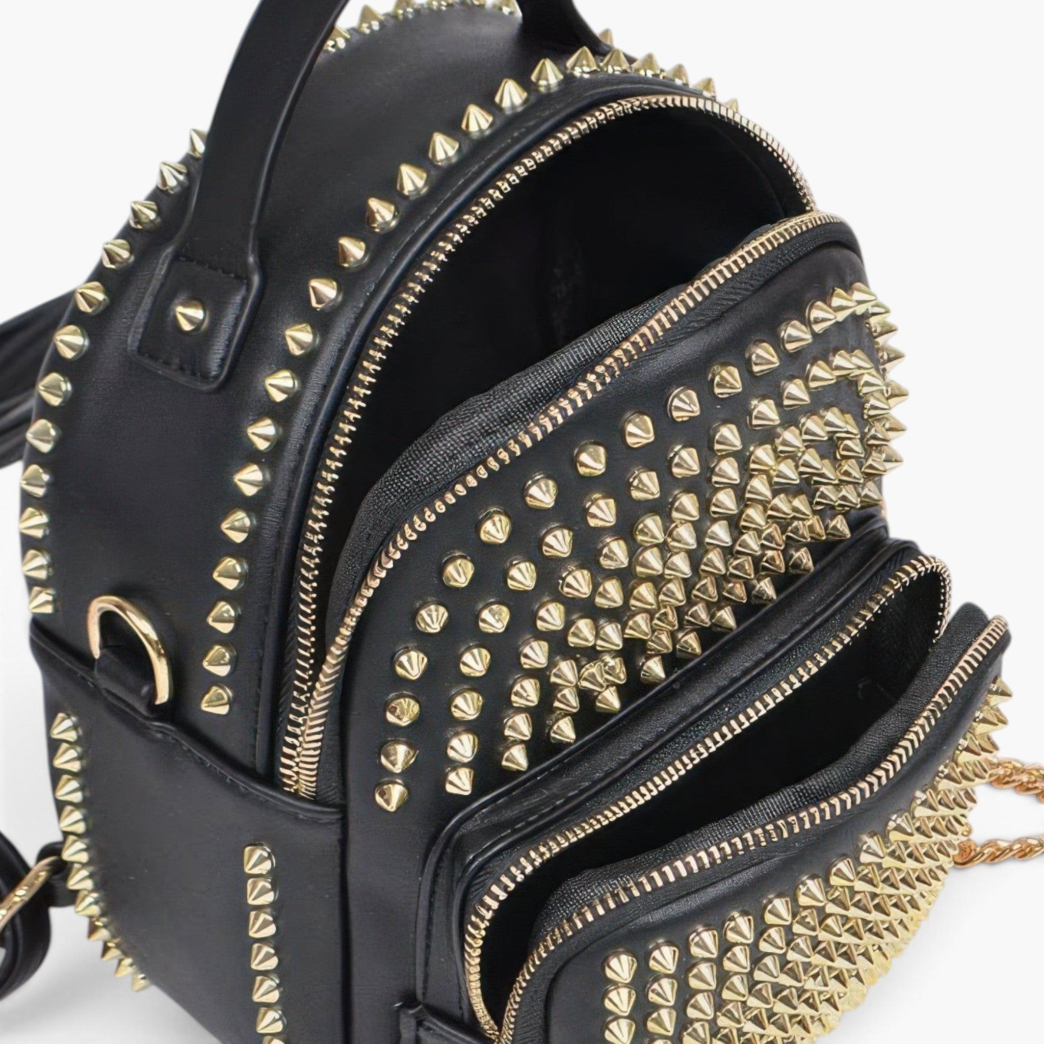 Beach Rose Co. black faux leather mini backpack featuring gold-tone studded detailing and multiple zippered pockets.