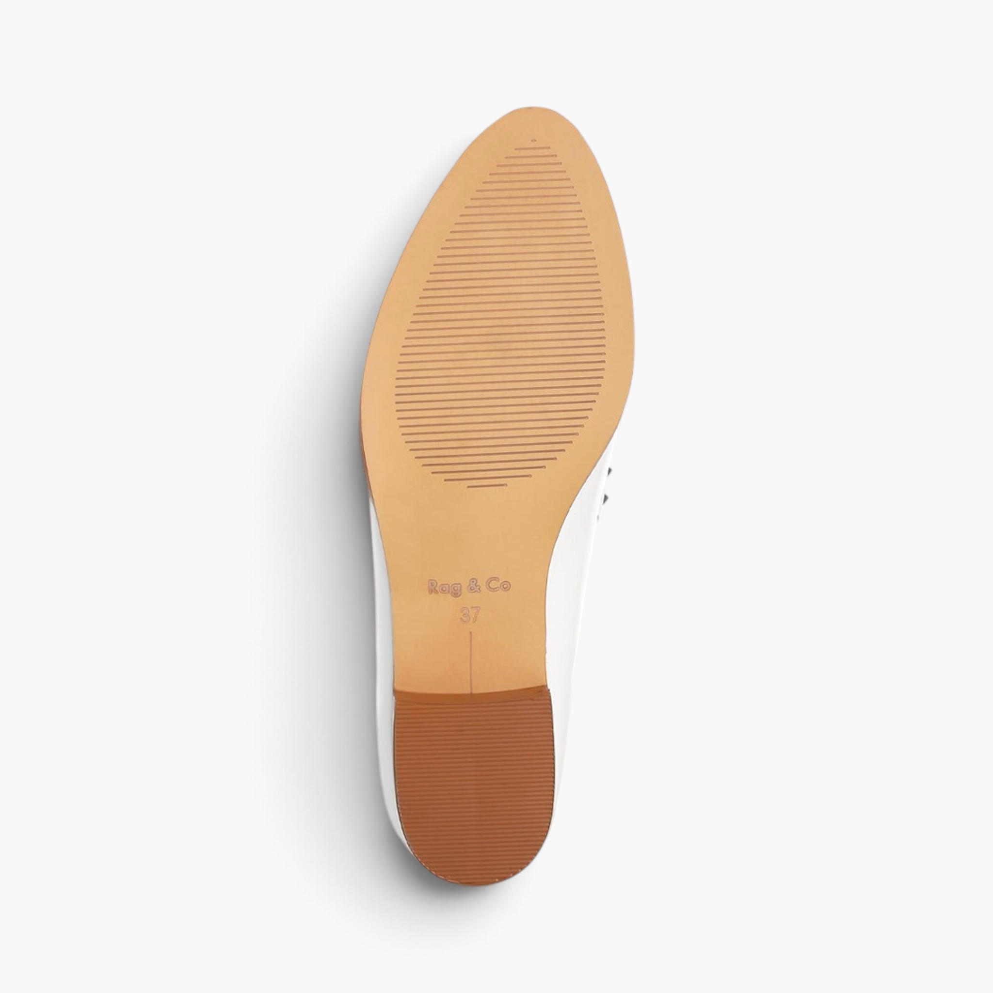 Beach Rose Co. studded penny loafer showing the brown rubber outsole and low block heel from a bottom view