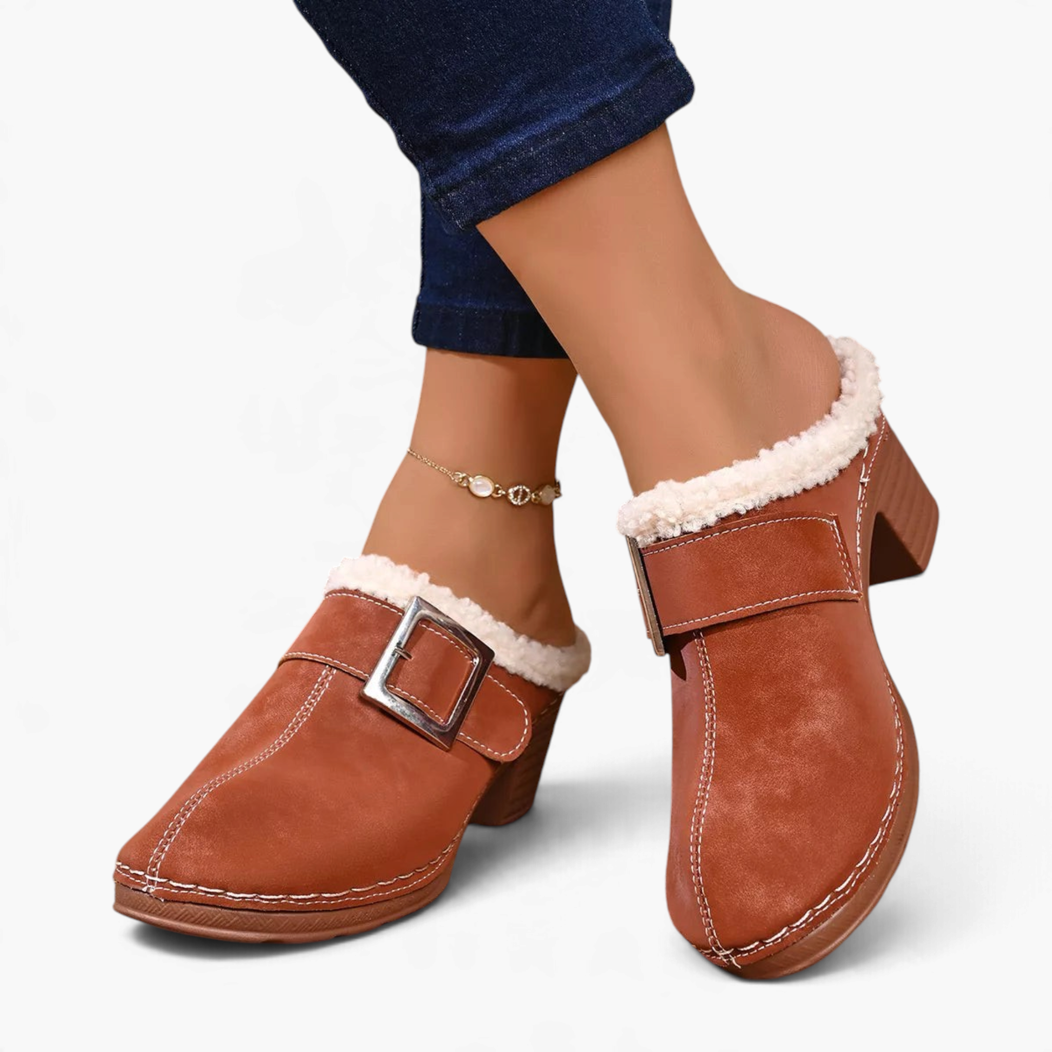 Beach Rose Co. brown suede clogs with fluffy trim, oversized buckle, contrast stitching, and chunky block heel.