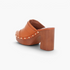 Beach Rose Co. tan leather platform clogs with gold stud trim, buckle detail, and a chunky wood-effect block heel.