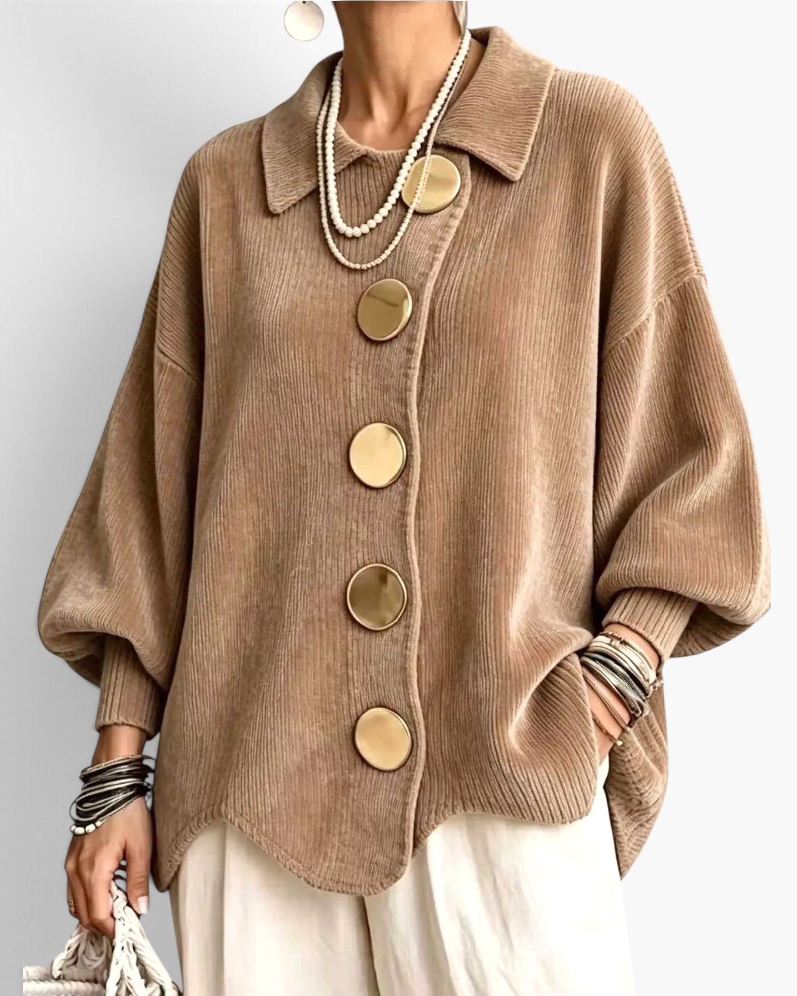 Beach Rose Co. tan ribbed knit cardigan with a fold-over collar, balloon sleeves, and oversized gold buttons.