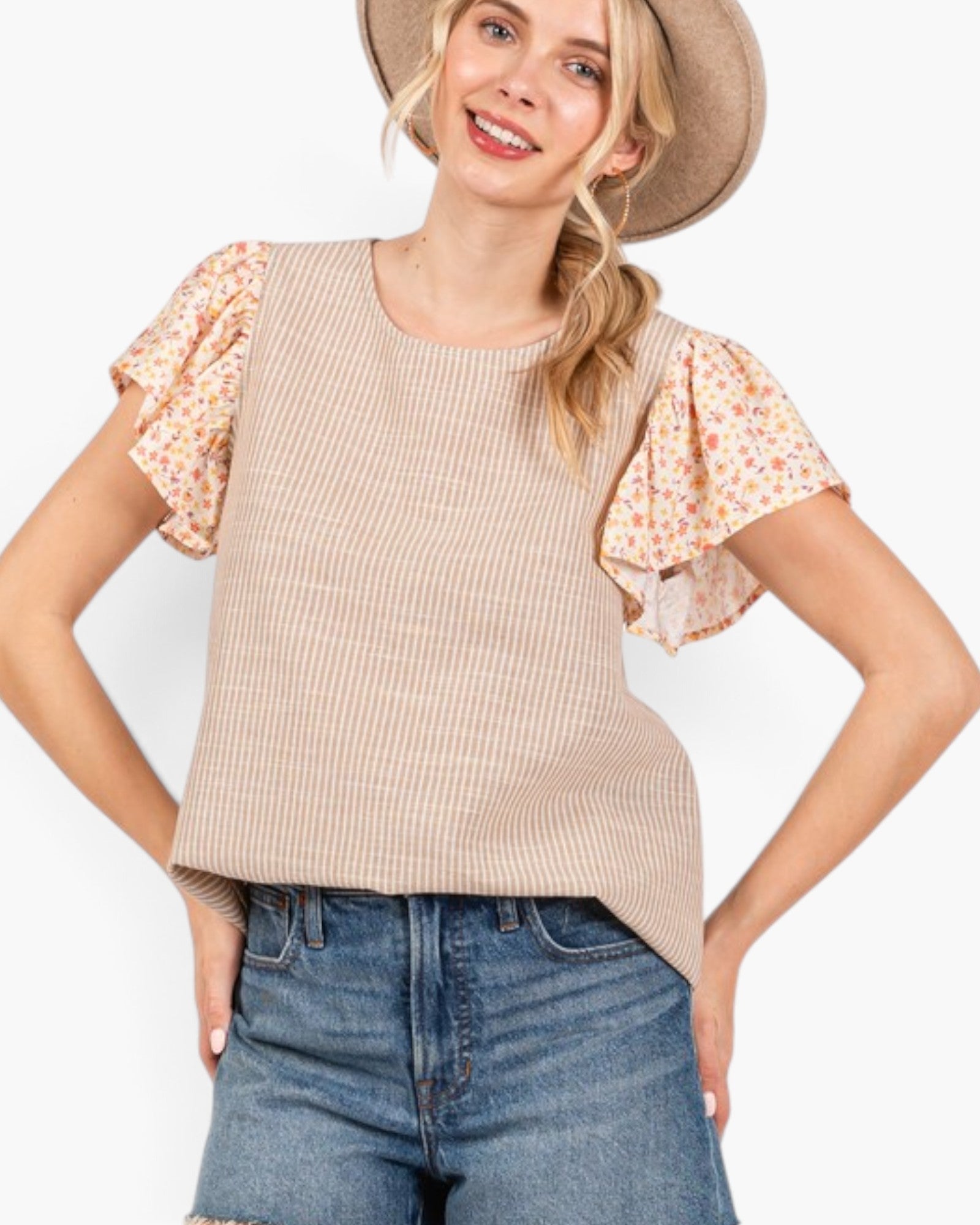 Beach Rose Co. tan striped top with floral flutter sleeves and a round neckline worn by a woman in a felt hat.