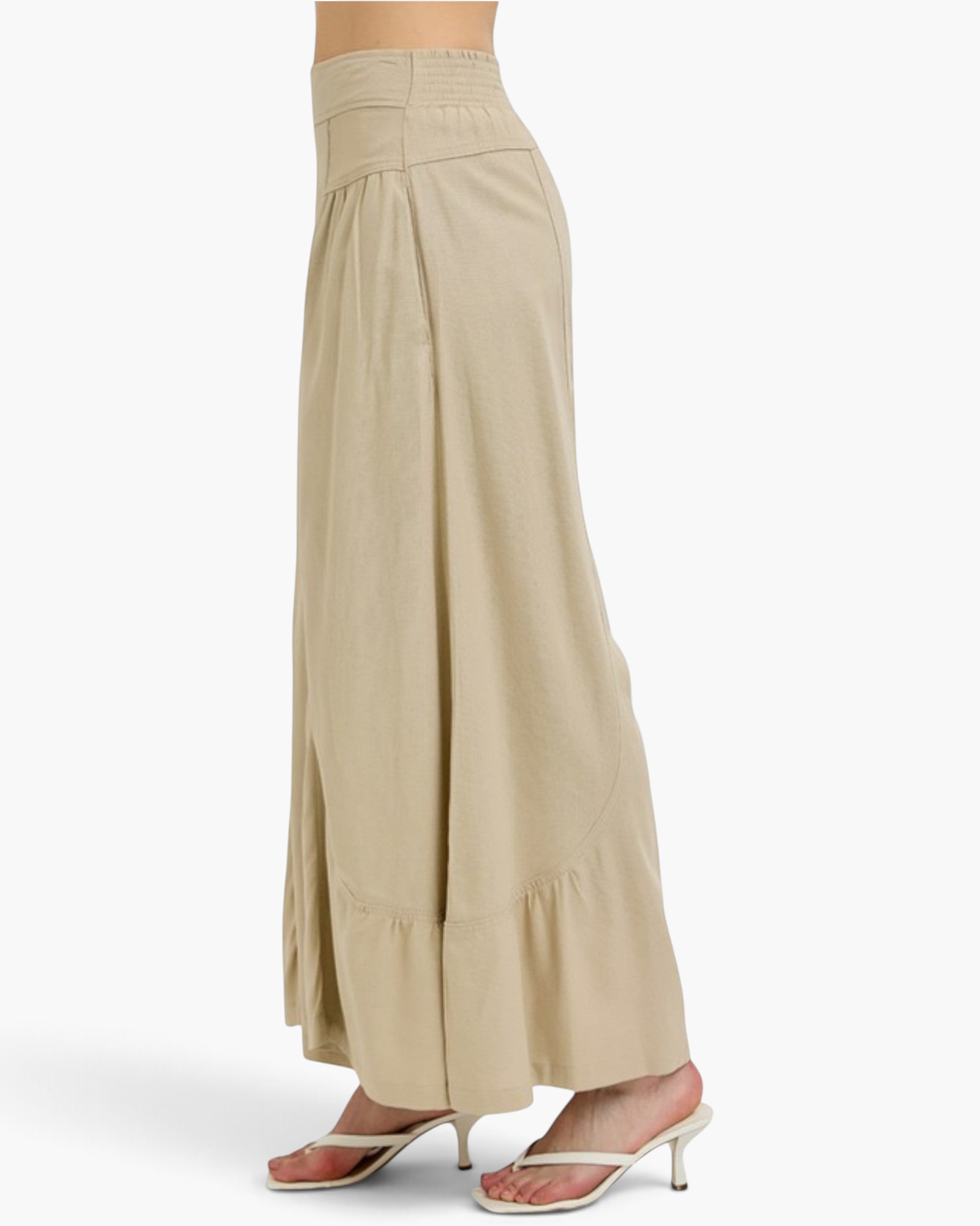Beach Rose Co. tan wide leg pants in a rayon linen blend featuring a smocked back waistband and gathered hem detail.