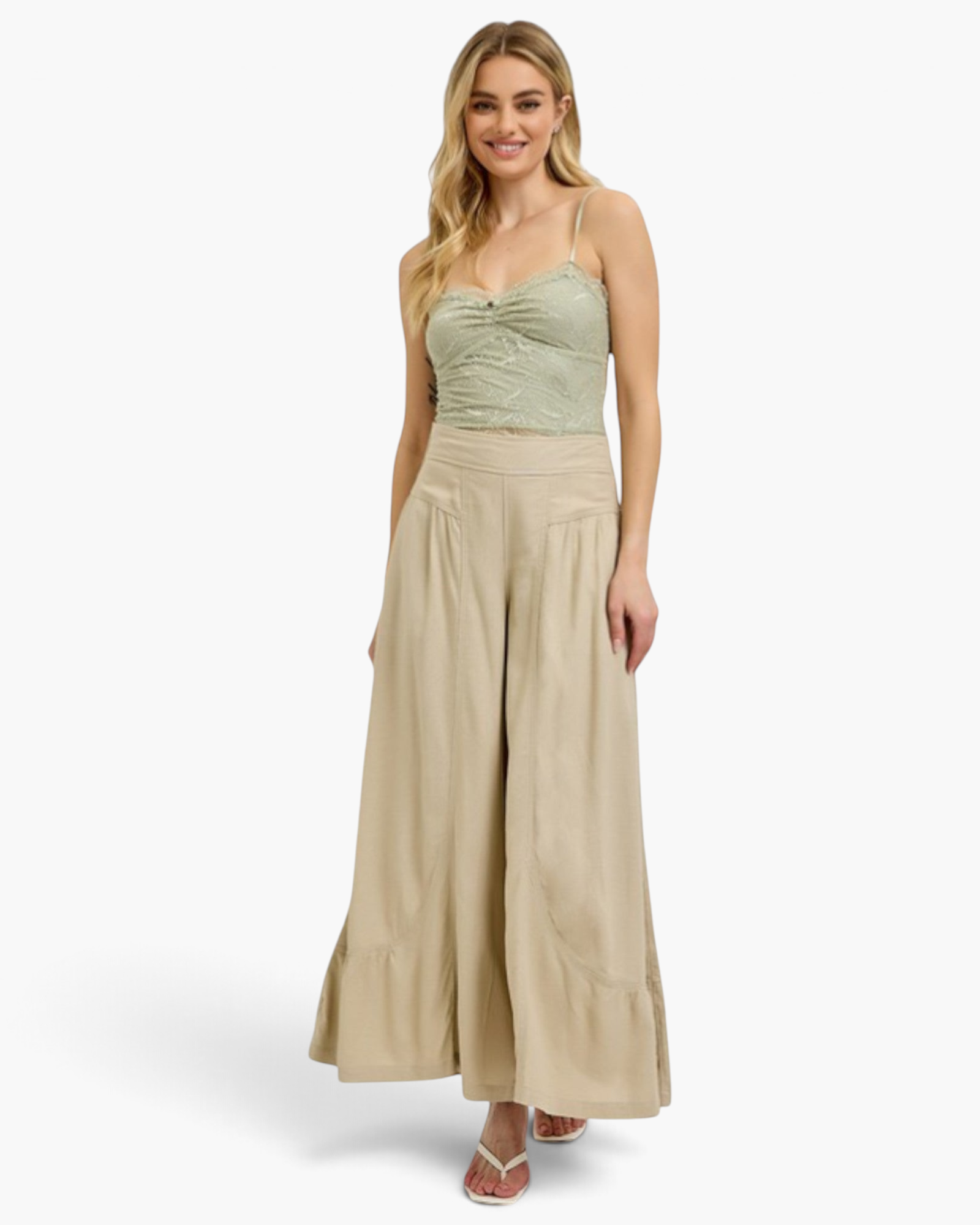 Beach Rose Co. tan wide leg pants featuring curved seams and gathered hems worn by a blonde model with a lace tank top