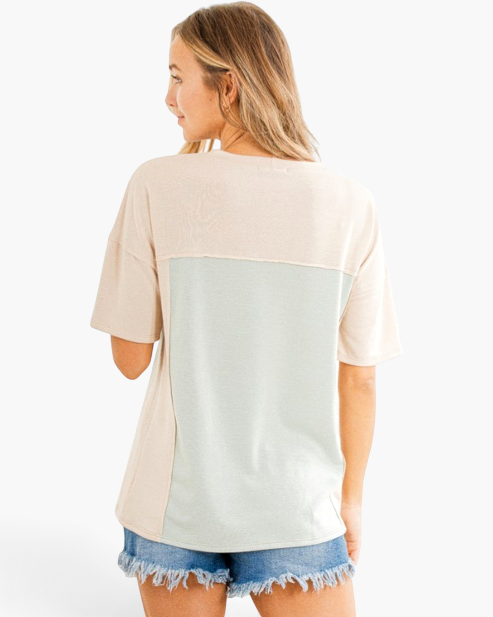 Beach Rose Co. relaxed fit taupe and light gray colorblock short sleeve top worn with denim shorts