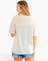 Beach Rose Co. relaxed fit taupe and light gray colorblock short sleeve top worn with denim shorts