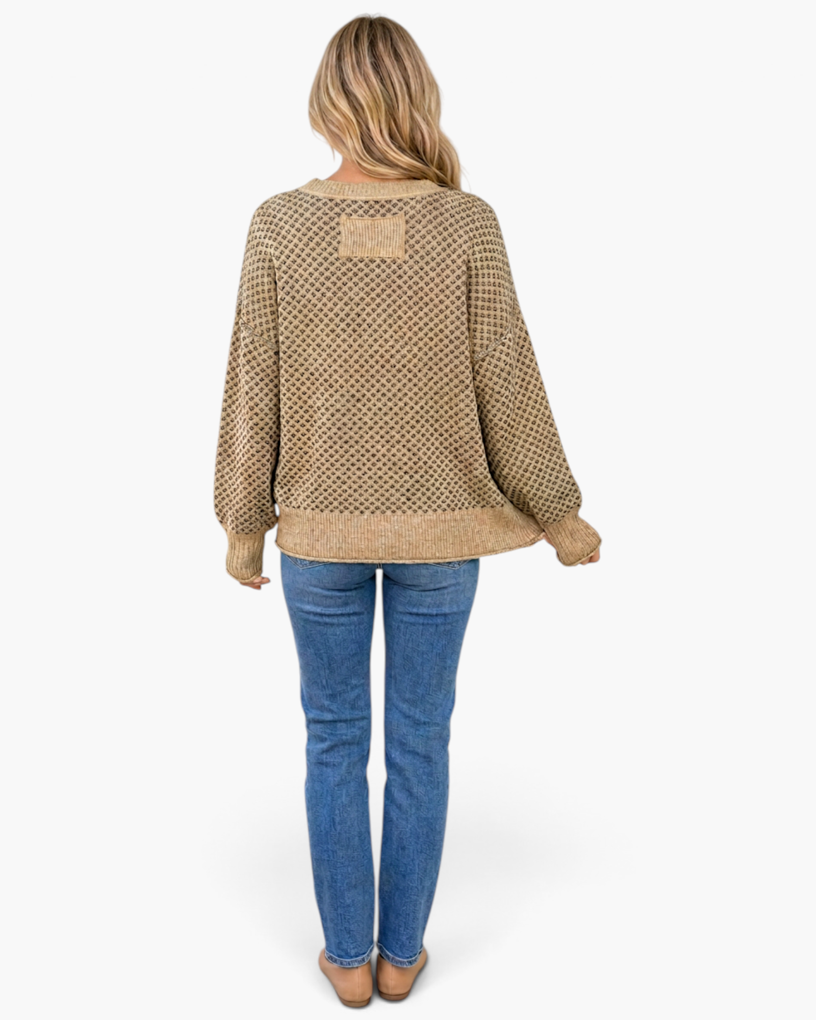 Beach Rose Co. taupe and charcoal diamond-knit sweater with a back patch detail worn with blue jeans