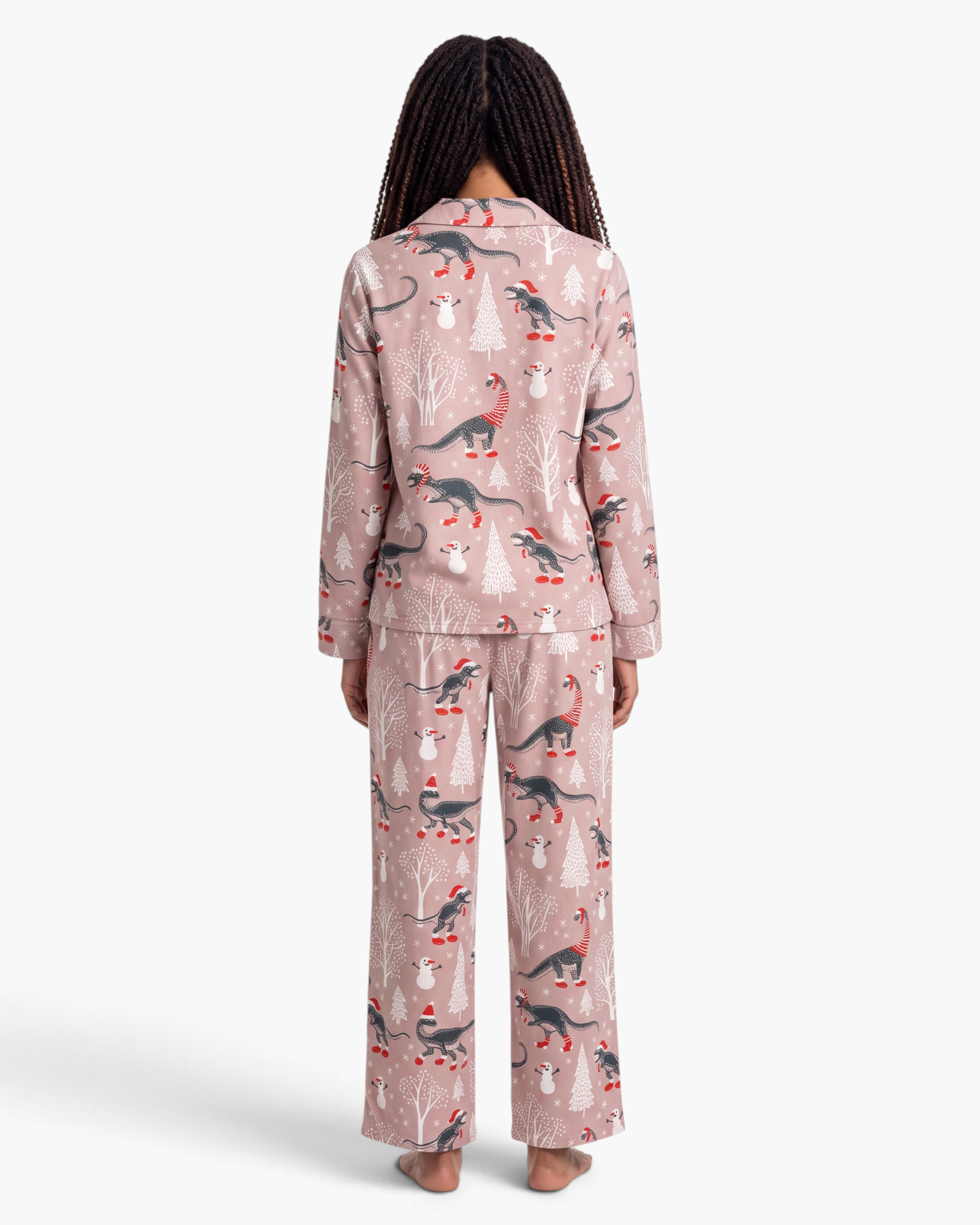Beach Rose Co. taupe pajama set with festive dinosaur print, featuring Santa-hatted dinosaurs on button-front top.