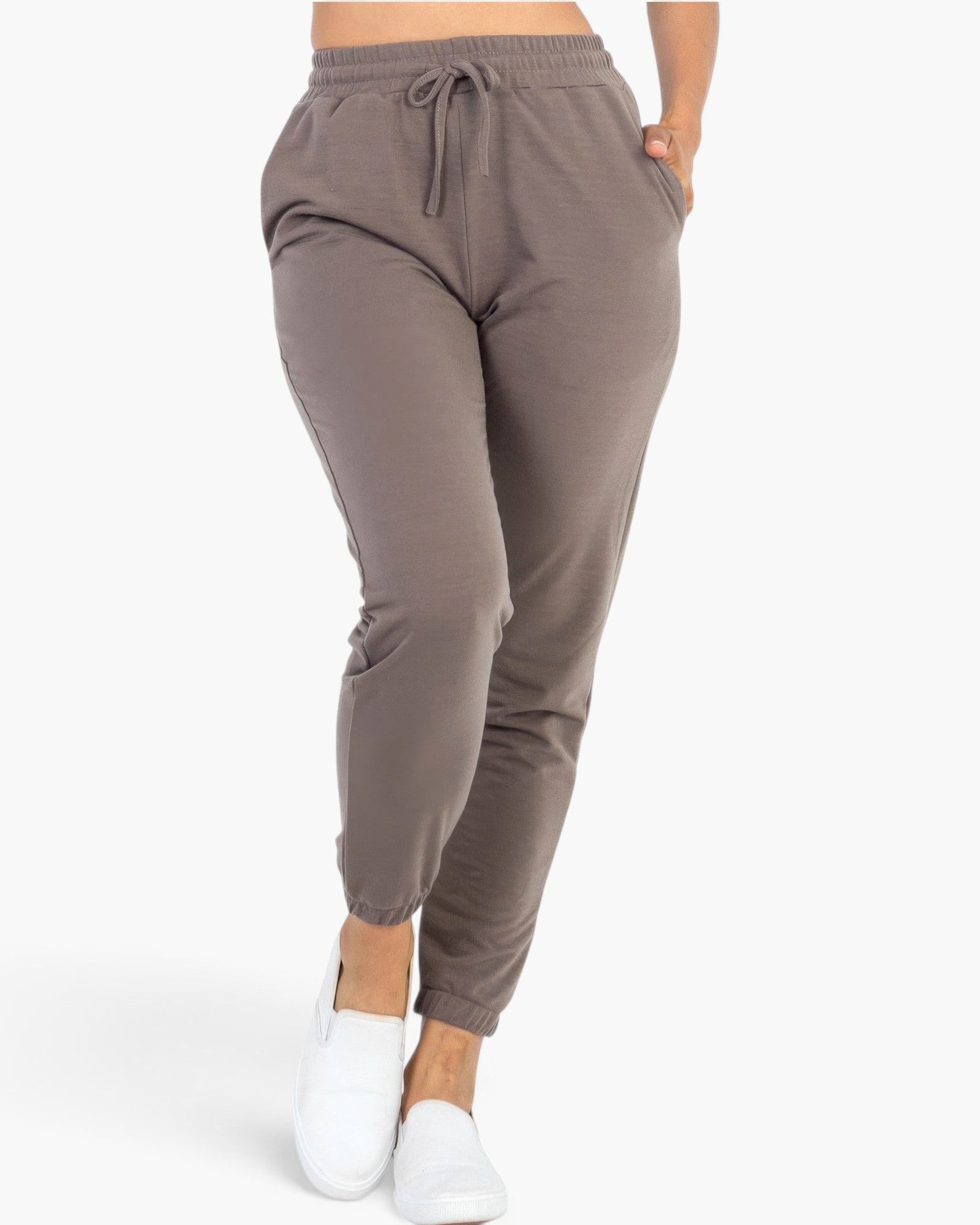 Beach Rose Co. taupe French Terry jogger pants with an elastic waistband, drawstring, and tapered cuffs.