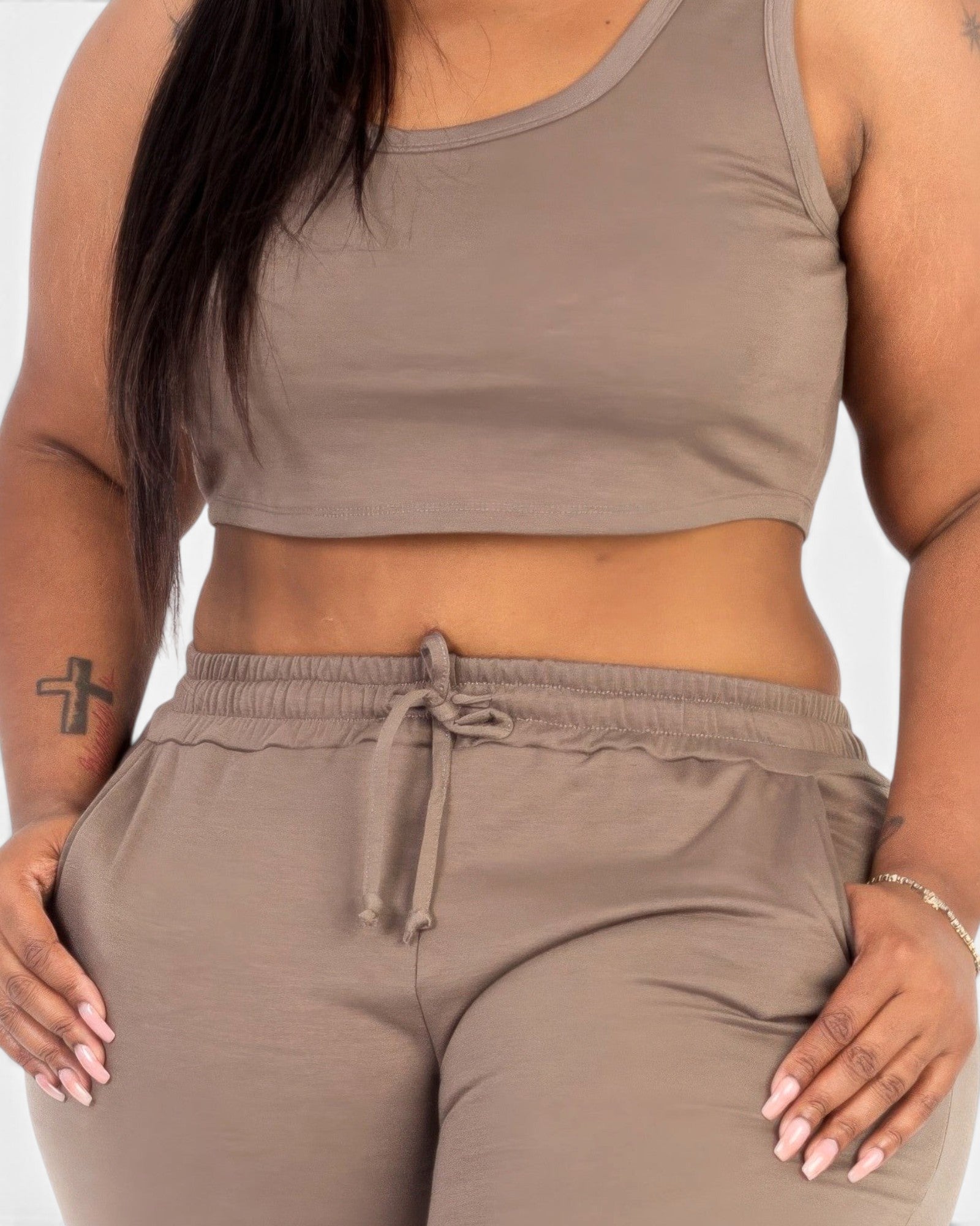 Beach Rose Co. plus size taupe French terry cropped tank top and drawstring jogger set on a model