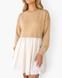 Beach Rose Co. taupe sweatshirt bodice dress with a gathered ivory skirt and long sleeves on a model
