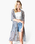 Beach Rose Co. taupe leopard print duster kimono with elbow-length sleeves worn over a white tank top and denim shorts.