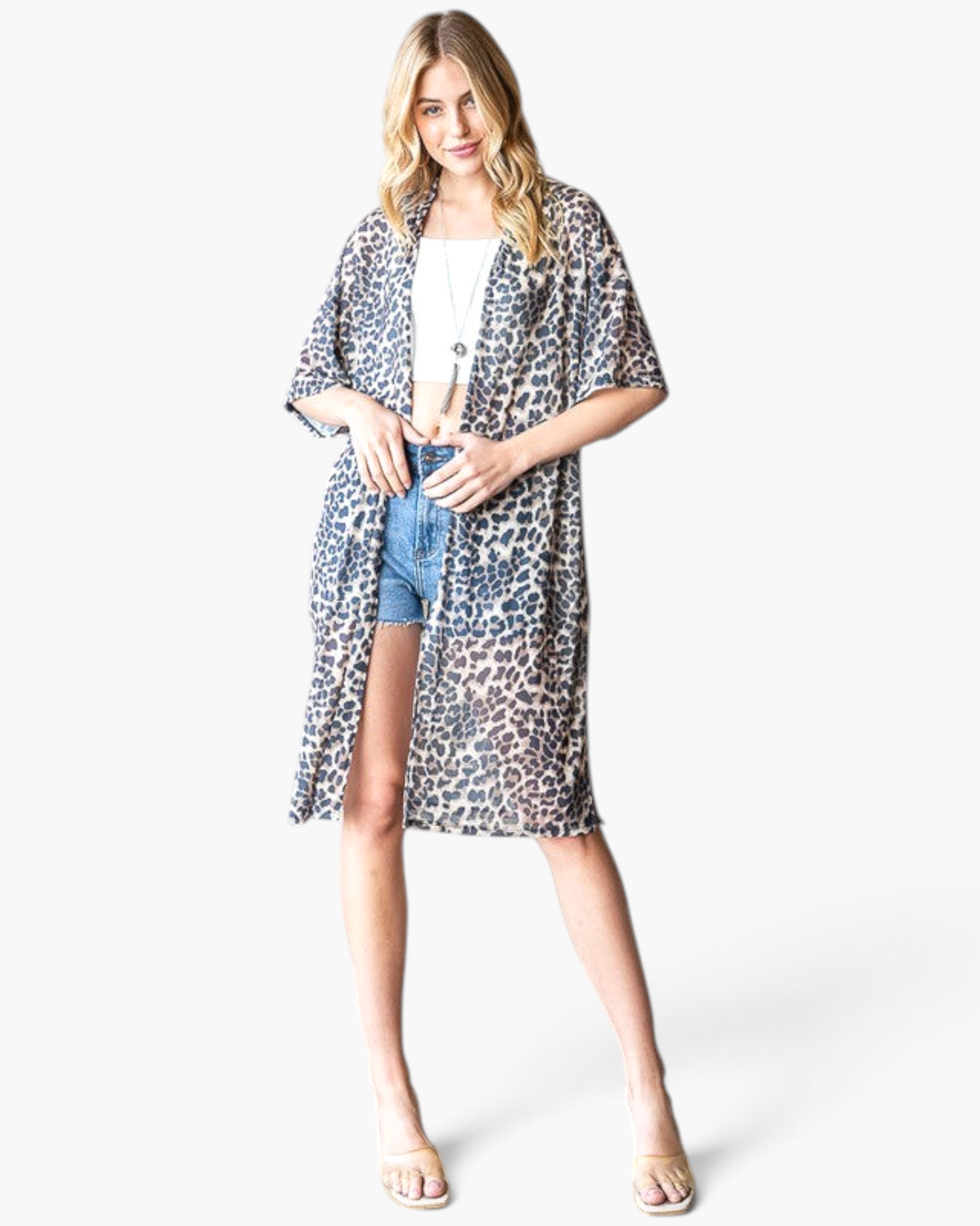 Beach Rose Co. taupe leopard print duster kimono with an open front and elbow-length sleeves on a blonde model