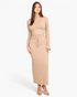 Beach Rose Co. taupe mock neck crop top and maxi skirt set with bell sleeves and drawstring waist on a model