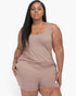 Beach Rose Co. plus size taupe gray tank top and shorts lounge set worn by a woman with long dark hair.
