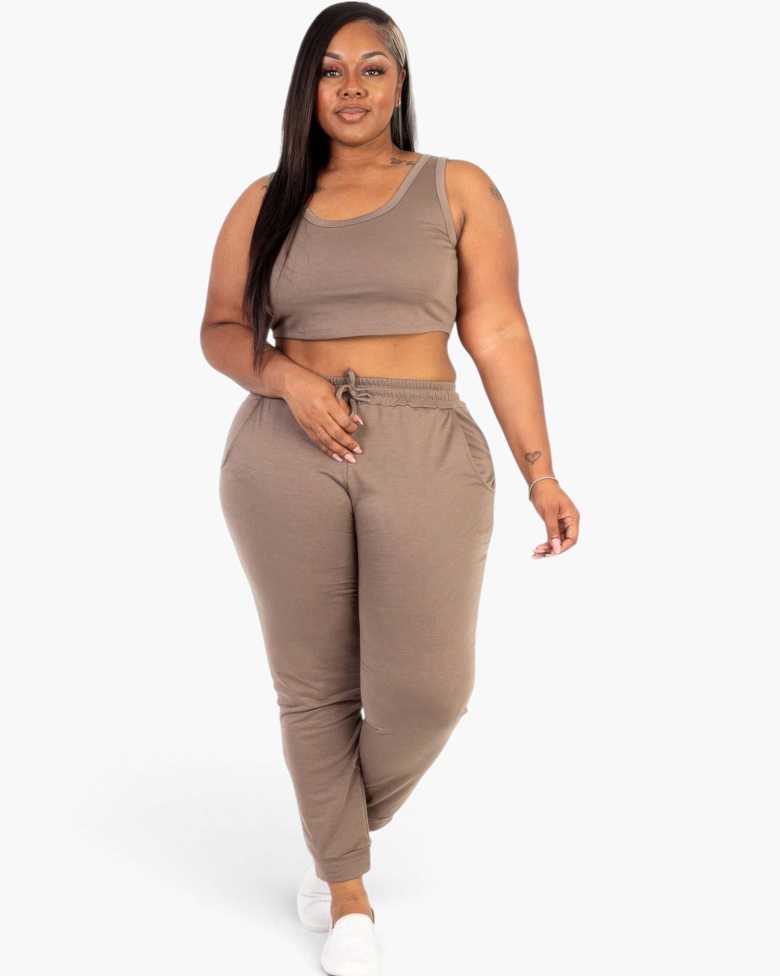 Beach Rose Co. plus size taupe French terry cropped tank top and jogger set worn by a model on a white background