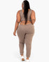 Beach Rose Co. plus size taupe French terry cropped tank top and joggers set worn by a model, back view
