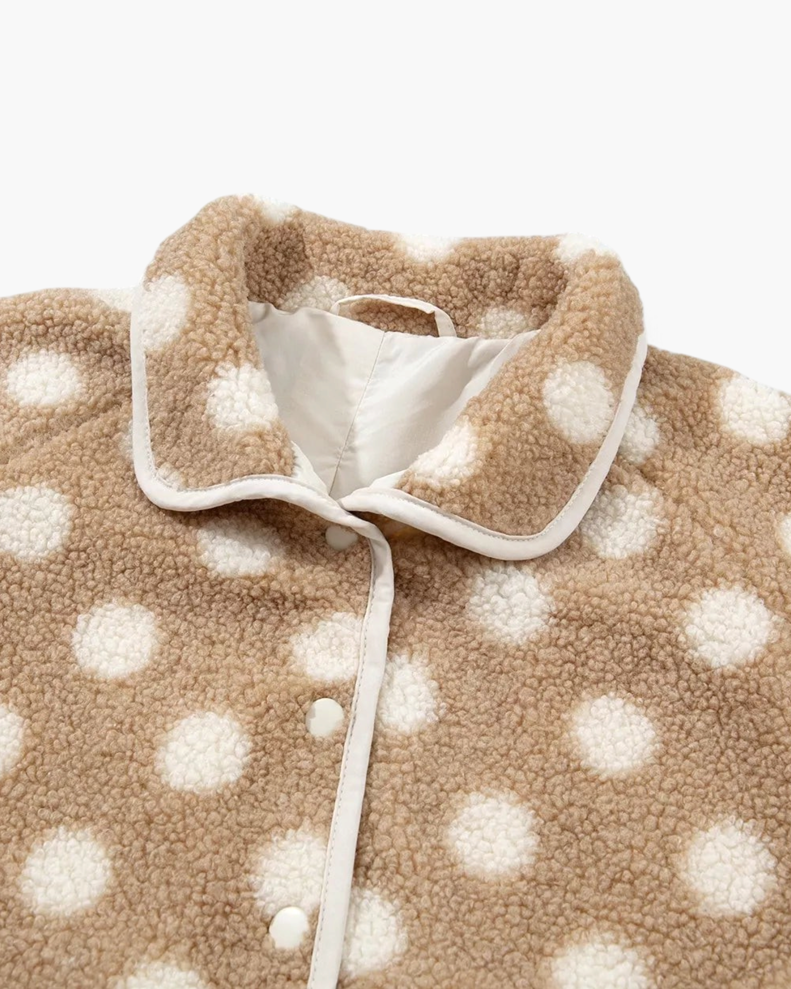 Beach Rose Co. taupe and cream polka dot teddy jacket with plush texture, stand collar, and snap-front closure.