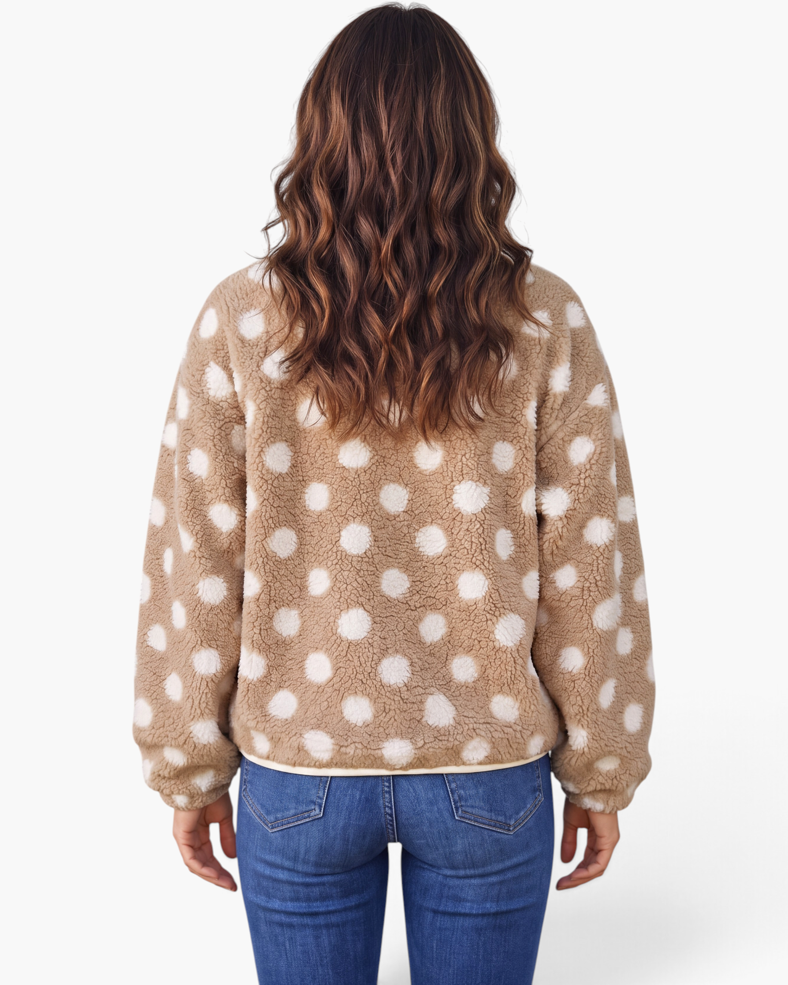 Back view of a model wearing a Beach Rose Co. taupe teddy jacket with cream polka dots and a relaxed fit.