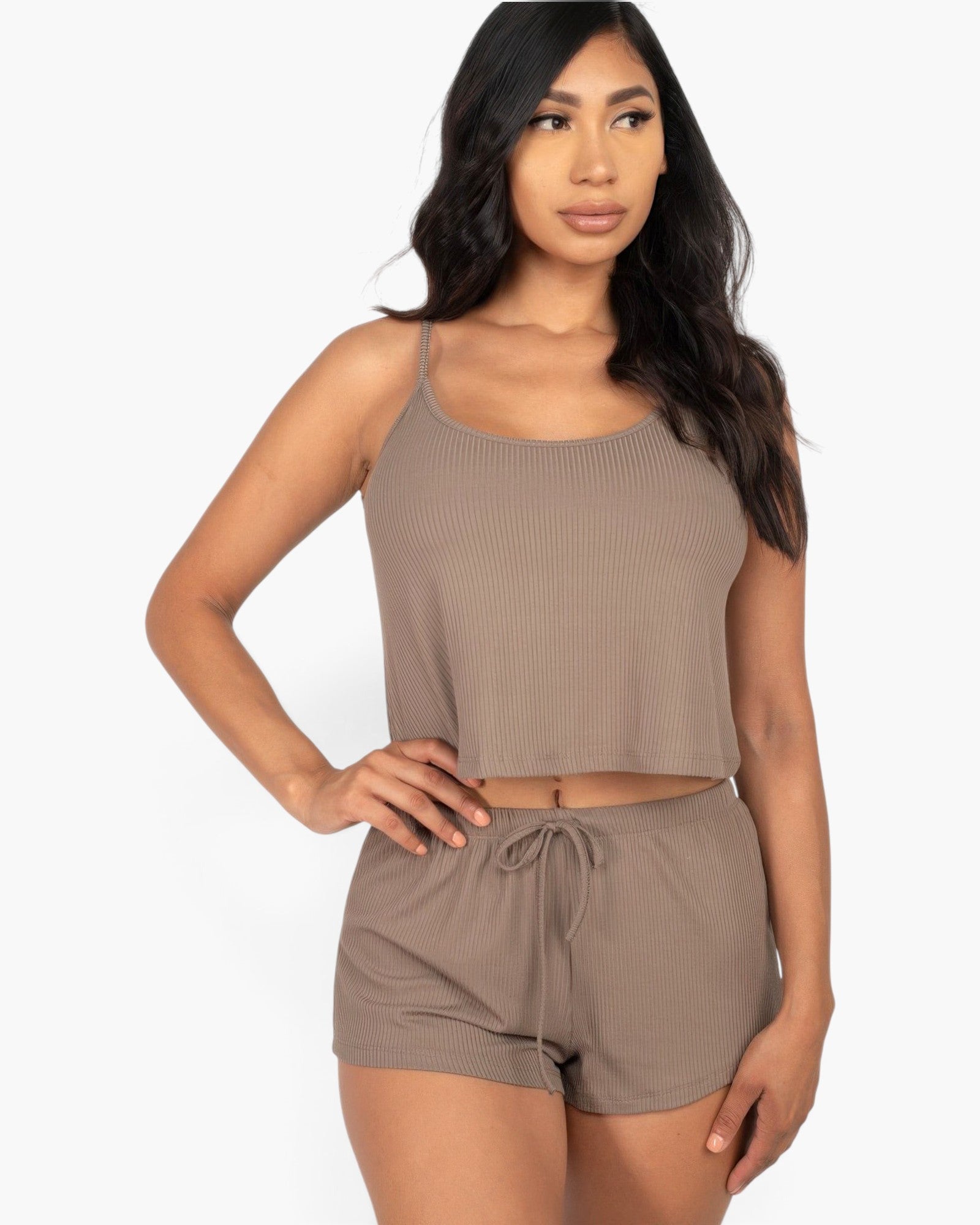 Beach Rose Co. taupe ribbed strappy top and matching shorts set worn by a woman against a white background