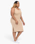 Beach Rose Co. plus size taupe ribbed tank midi dress with side slits worn by a model with white sneakers