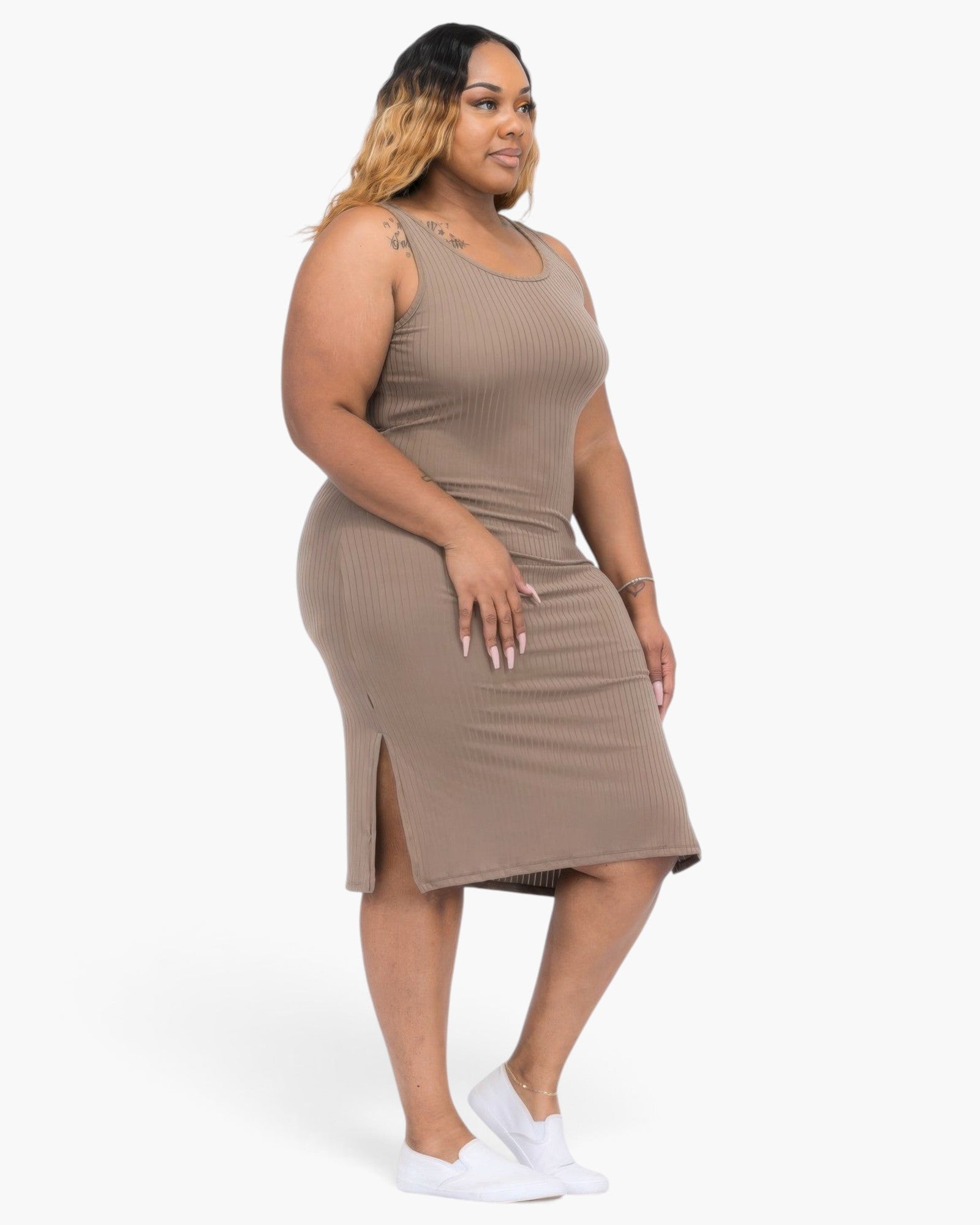 Beach Rose Co. plus size taupe ribbed tank midi dress with side slits worn by a model with white sneakers