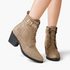 Beach Rose Co. taupe suede ankle boots with lace-up front, buckle strap, and chunky block heel on a white background.