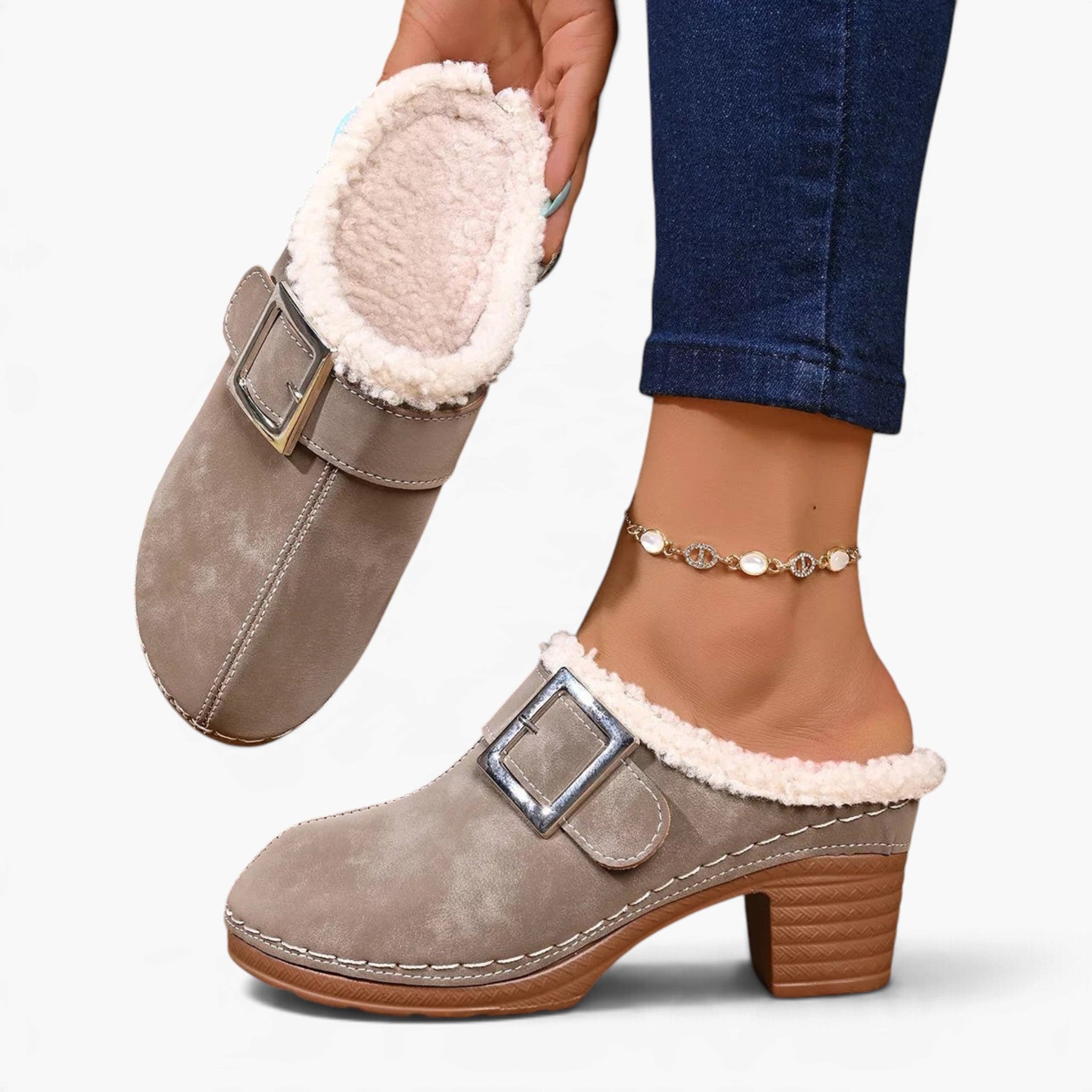 Beach Rose Co. taupe suede clogs featuring fluffy lining, an oversized buckle, and a chunky block heel.
