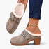 Beach Rose Co. taupe suede clogs featuring fluffy lining, an oversized buckle, and a chunky block heel.