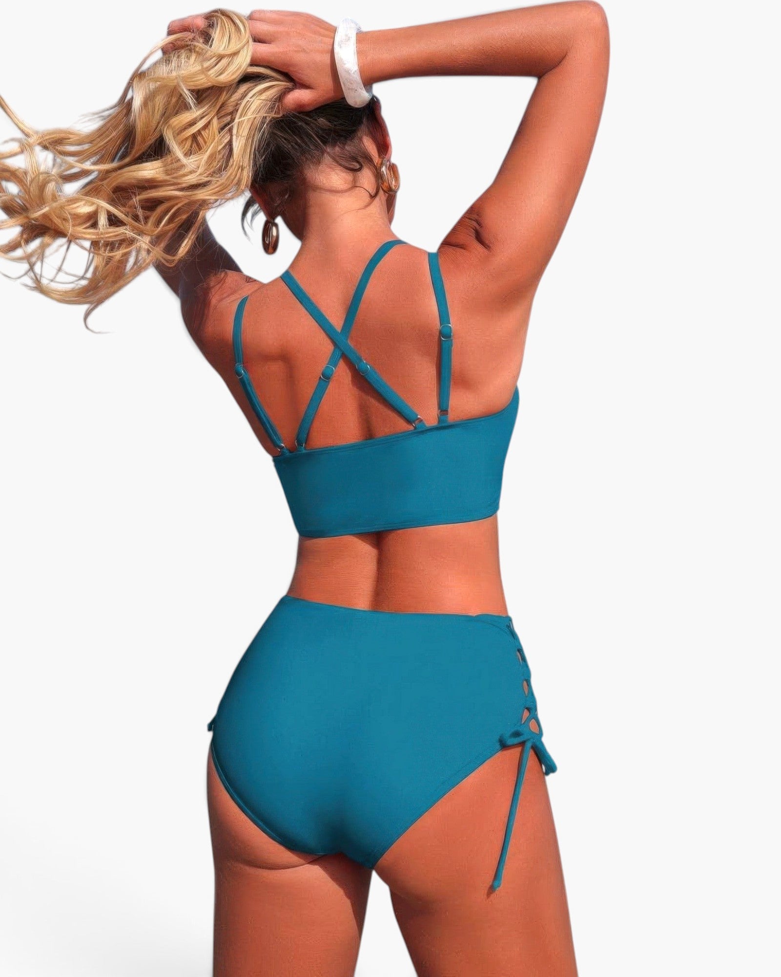 Beach Rose Co. teal two-piece bikini with high-waisted bottoms and cross-back straps on a model