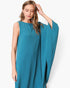 Beach Rose Co. teal matte crepe one-sleeve dress with a fluid, asymmetrical silhouette worn by a model.