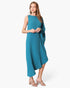 Beach Rose Co. teal matte crepe one-sleeve dress with an asymmetrical hem worn by a model on a white background.