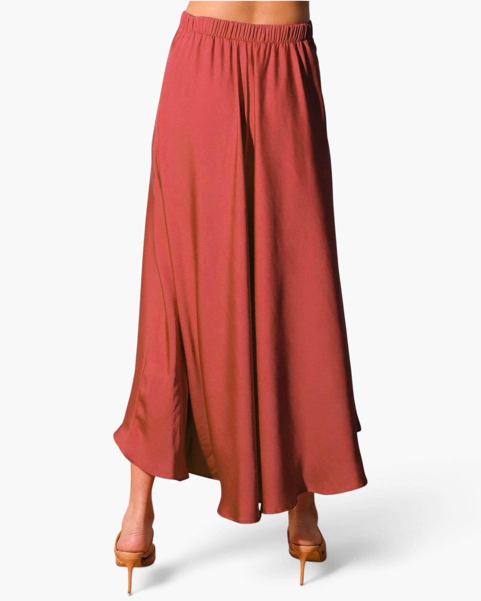 Beach Rose Co. washed poly silk midi swing skirt in a deep terracotta shade with an elastic waistband