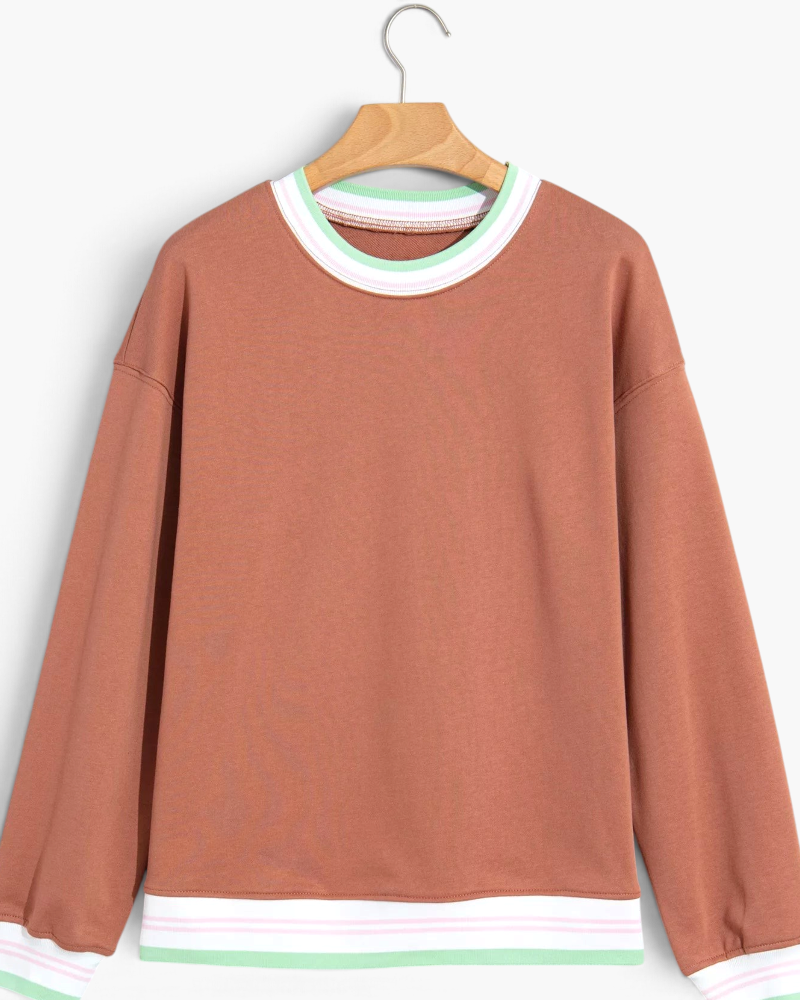 Beach Rose Co. terracotta crewneck sweatshirt with pastel striped trim on the neckline, cuffs, and hem.