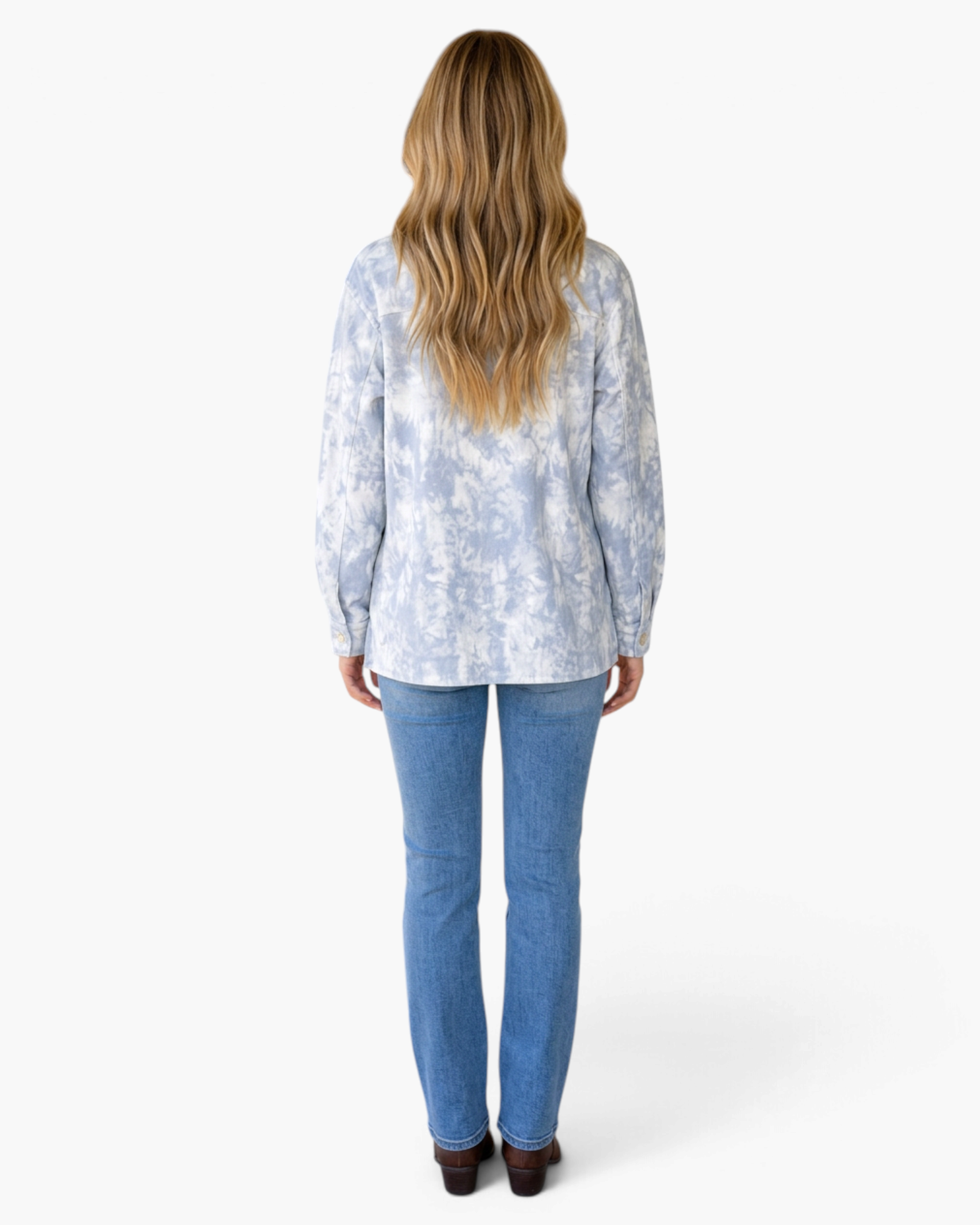 Beach Rose Co. light blue and white tie-dye corduroy shacket worn by a woman from the back view