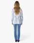 Beach Rose Co. light blue and white tie-dye corduroy shacket worn by a woman from the back view